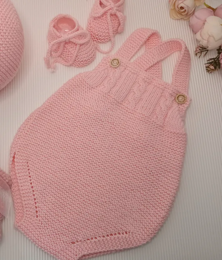 Monito rosado para bebé hecho a mano